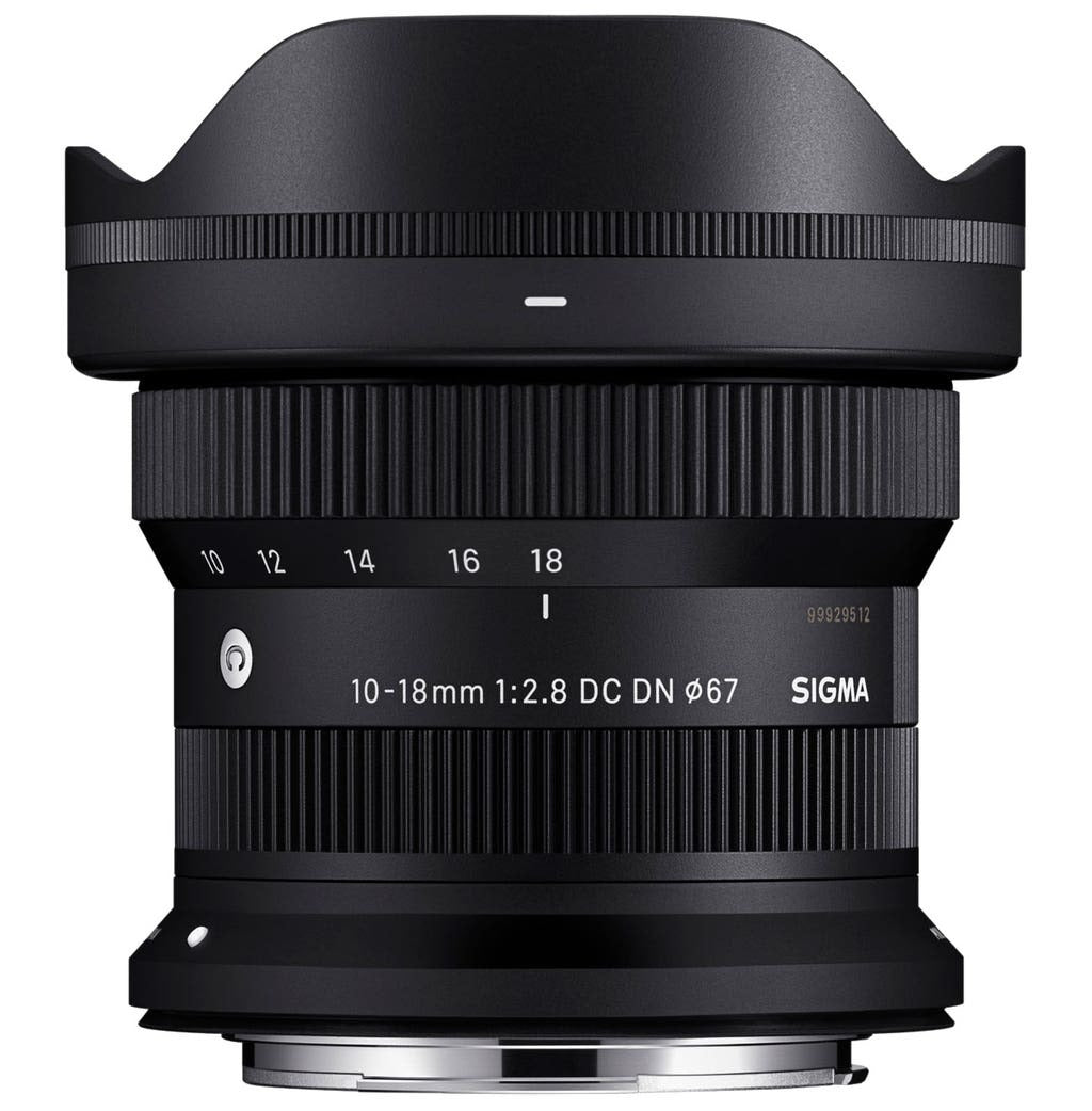 Black camera lens with 10-18mm zoom scale, textured grip, and rear mount