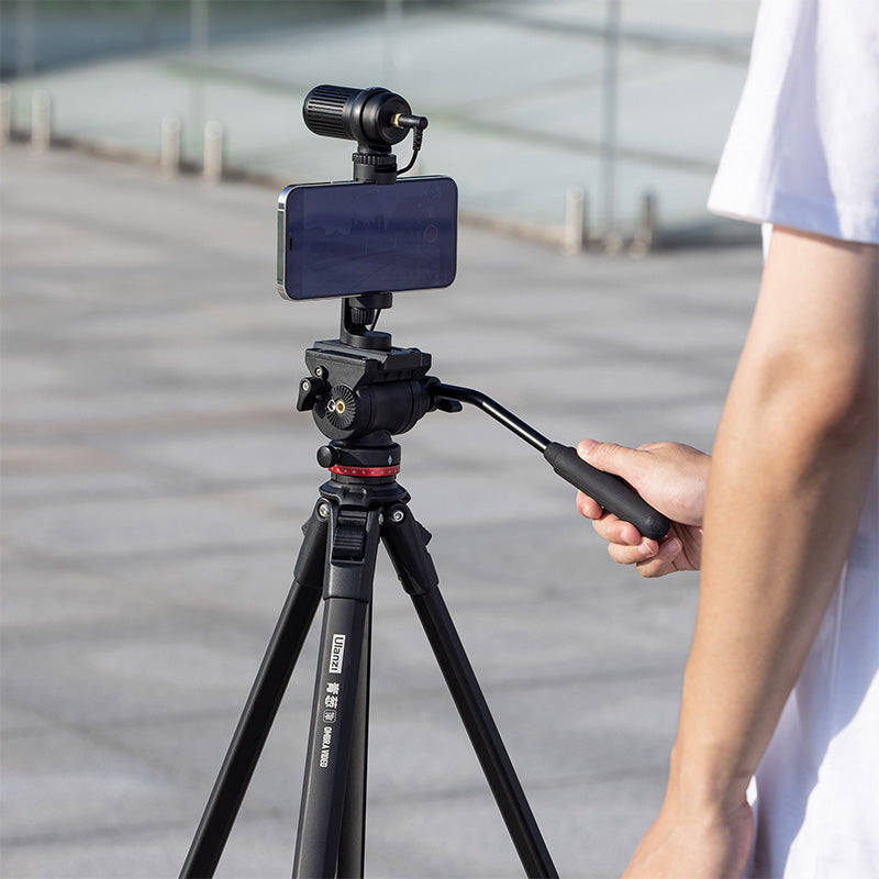 Ulanzi OMBRA video travel tripod with smartphone mounted, black tripod and handle