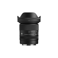 Black Sigma 20-60mm zoom camera lens, front element and zoom ring visible