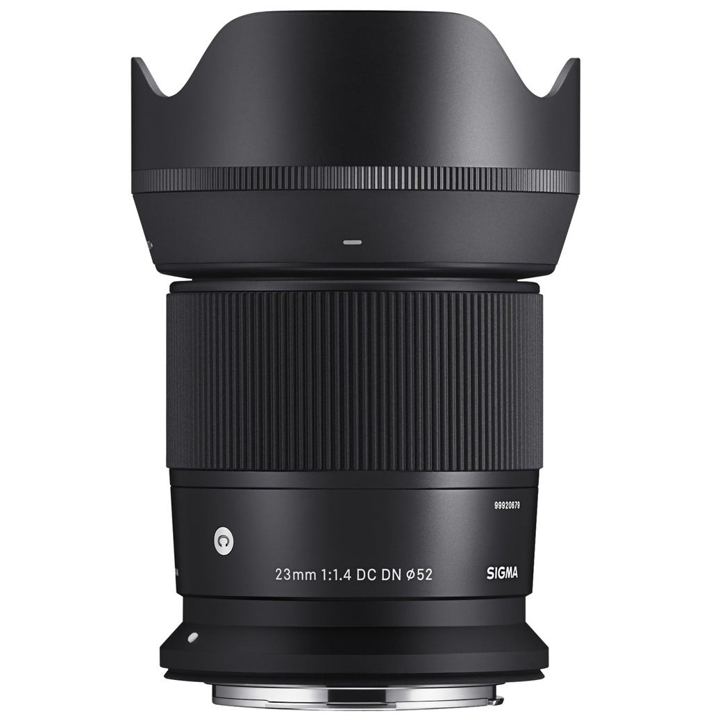 Black camera lens with ridged middle section and metal mount contacts at base