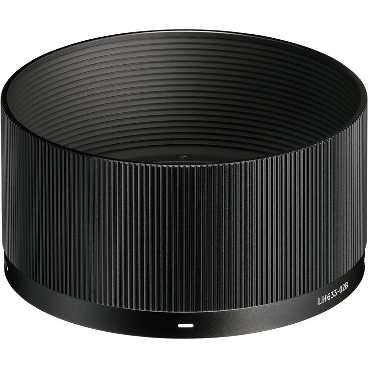 SIGMA 50mm F2 DG lens front with ridged texture and black mounting rim