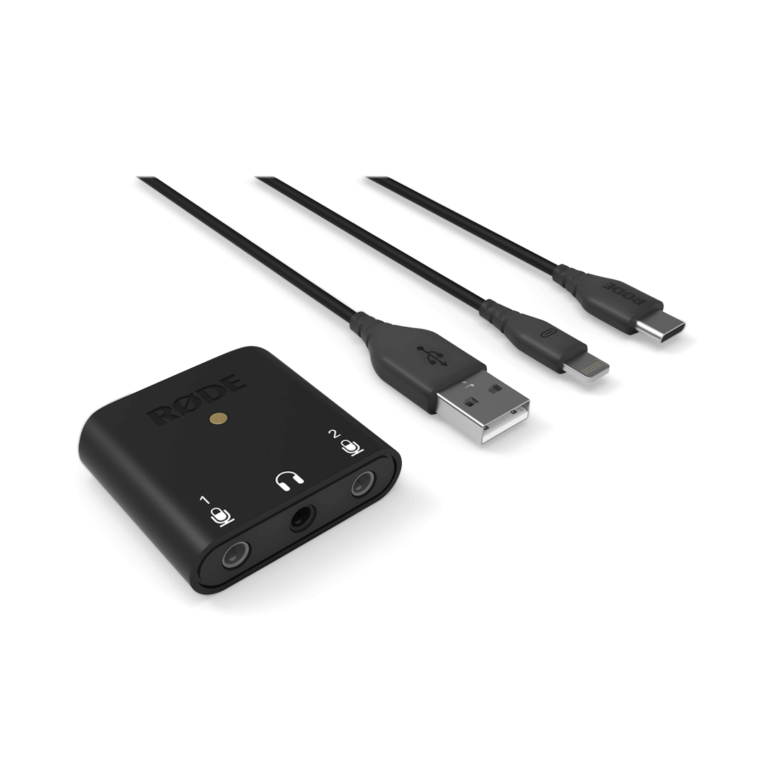 RØDE black compact audio interface with connected cables and front ports