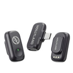 Space gray wireless clip-on microphone transmitters