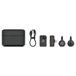 Wireless audio accessory kit with charging case, cable, two transmitters, and earbuds