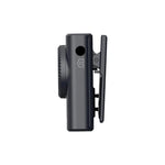 Wireless audio transmitter body with clip and ports, dark charcoal gray