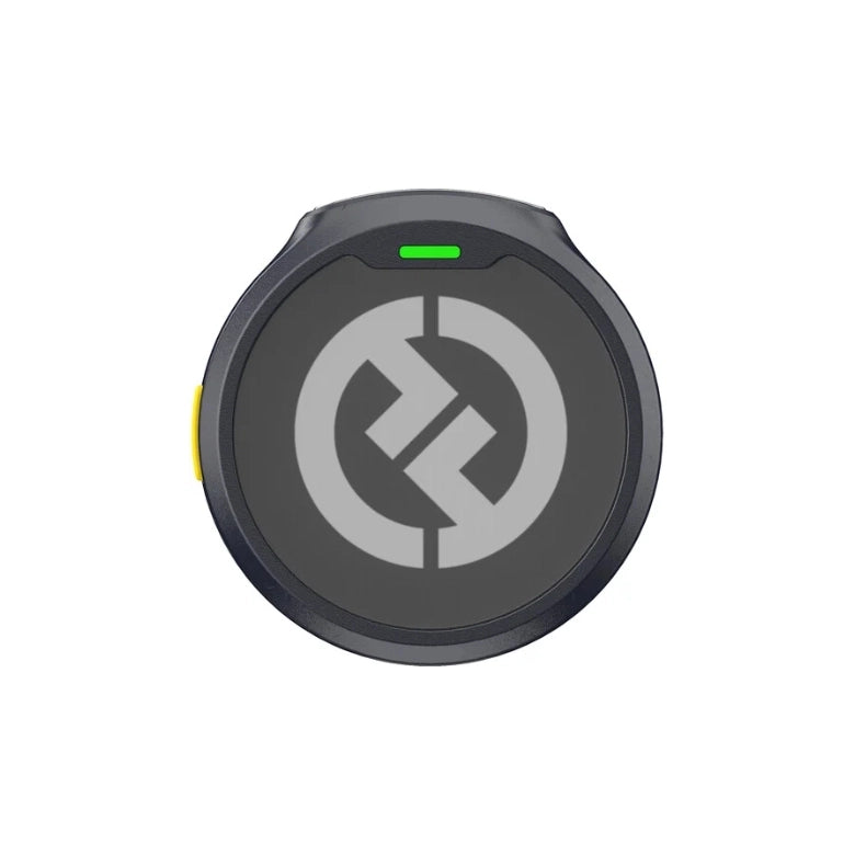 Wireless microphone receiver, round unit with dark face and green indicator