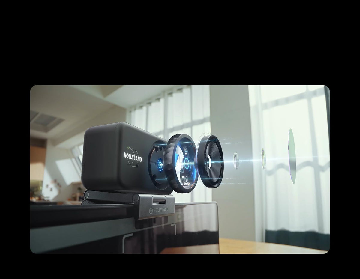 Black streaming transmitter on desk mount with glowing blue indicator ring