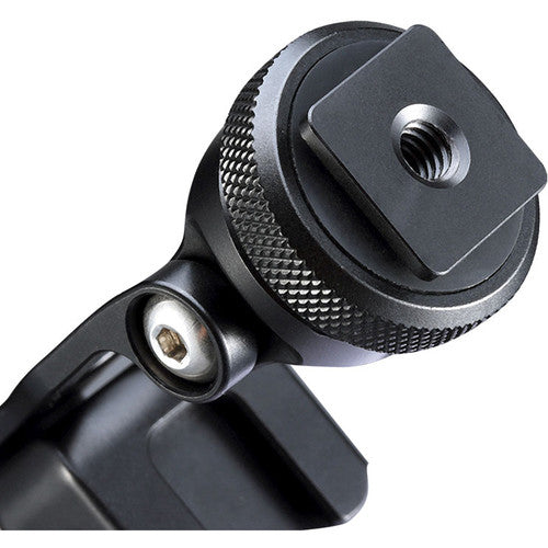 Close-up of black textured adjustment knob on a hot shoe phone clamp