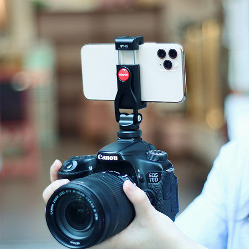 Black hot shoe phone clamp holding a smartphone at the top