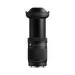 Telephoto zoom camera lens viewed from the side, showing engraved scale markings