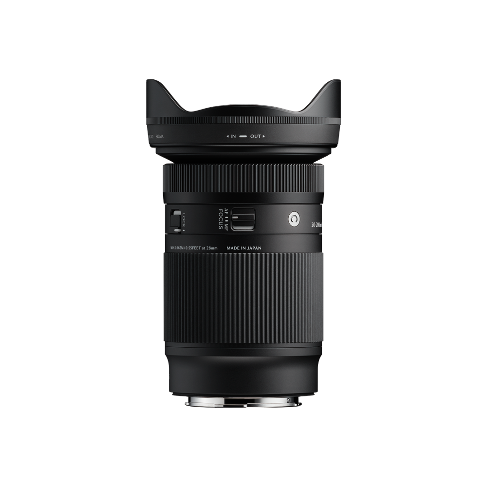 Telephoto zoom camera lens with ridged barrel and front filter rim