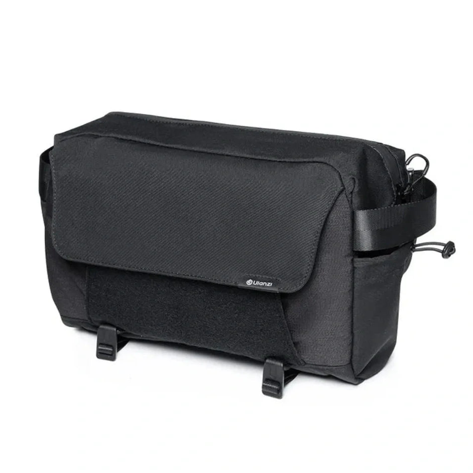 Black sling bag with front flap pocket and adjustable shoulder strap, Ulanzi logo patch.