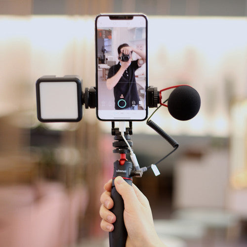 Black metal hot shoe phone clamp with mount and adjustable holder