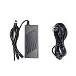 Ulanzi AD-1 power adapter for 120W Video Light Black power adapter with cables on a white background