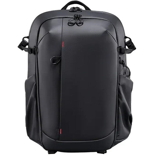 Black camera backpack with front zip pocket and padded shoulder straps