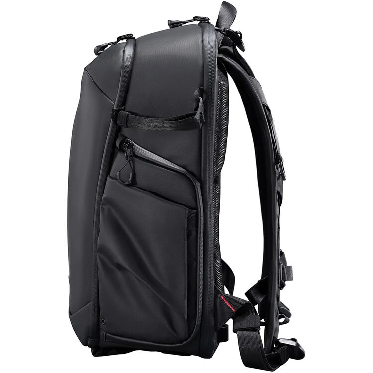 Black camera backpack side view with mesh back panel and padded front storage