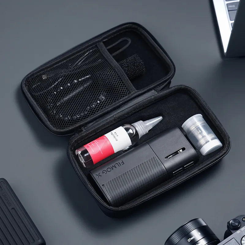 Fog machine accessory case with black molded organizer, filter pad, nozzles, and canisters.