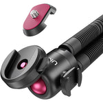 Octopus tripod head with pink quick-release knob and matte black mount