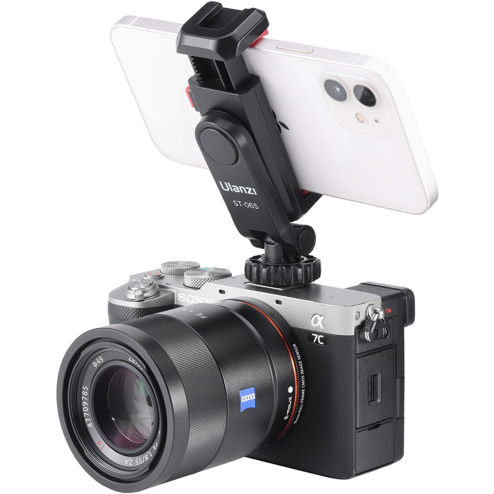 Black phone clamp mounted on a camera with cold shoe and smartphone holder