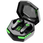 Black gaming wireless earbuds in open charging case with green LED accents
