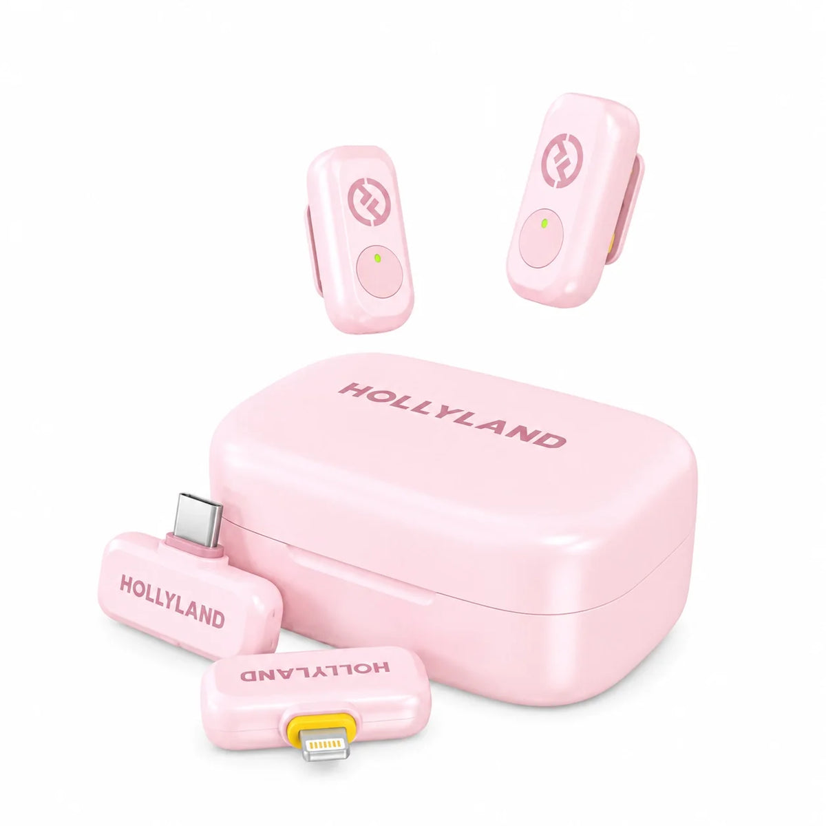 Pink wireless microphone kit with charging case, two clip-on transmitters, and charging cable.